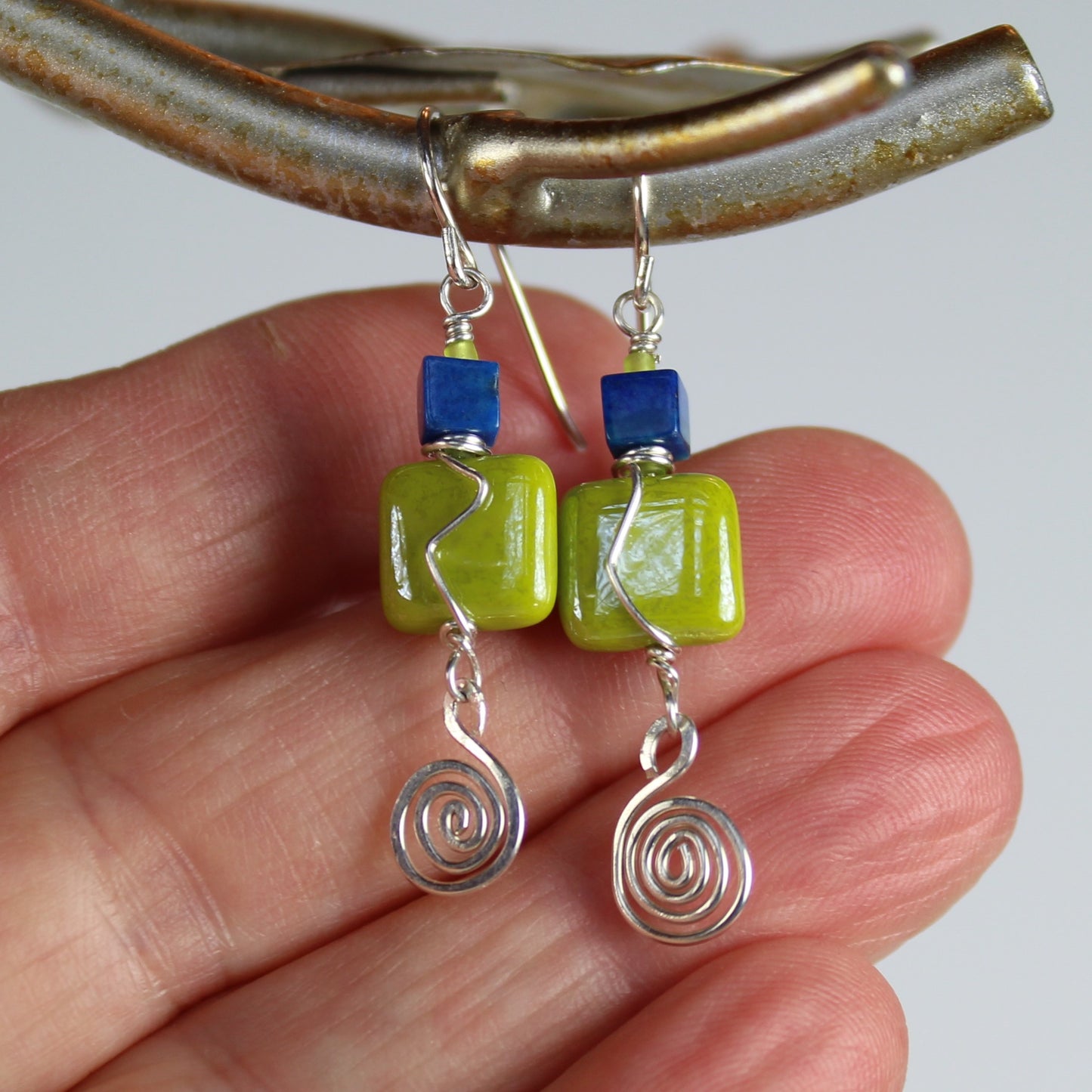 Light green glass and blue lapis squares on sterling silver earrings with hammered sterling wire spiral dangle