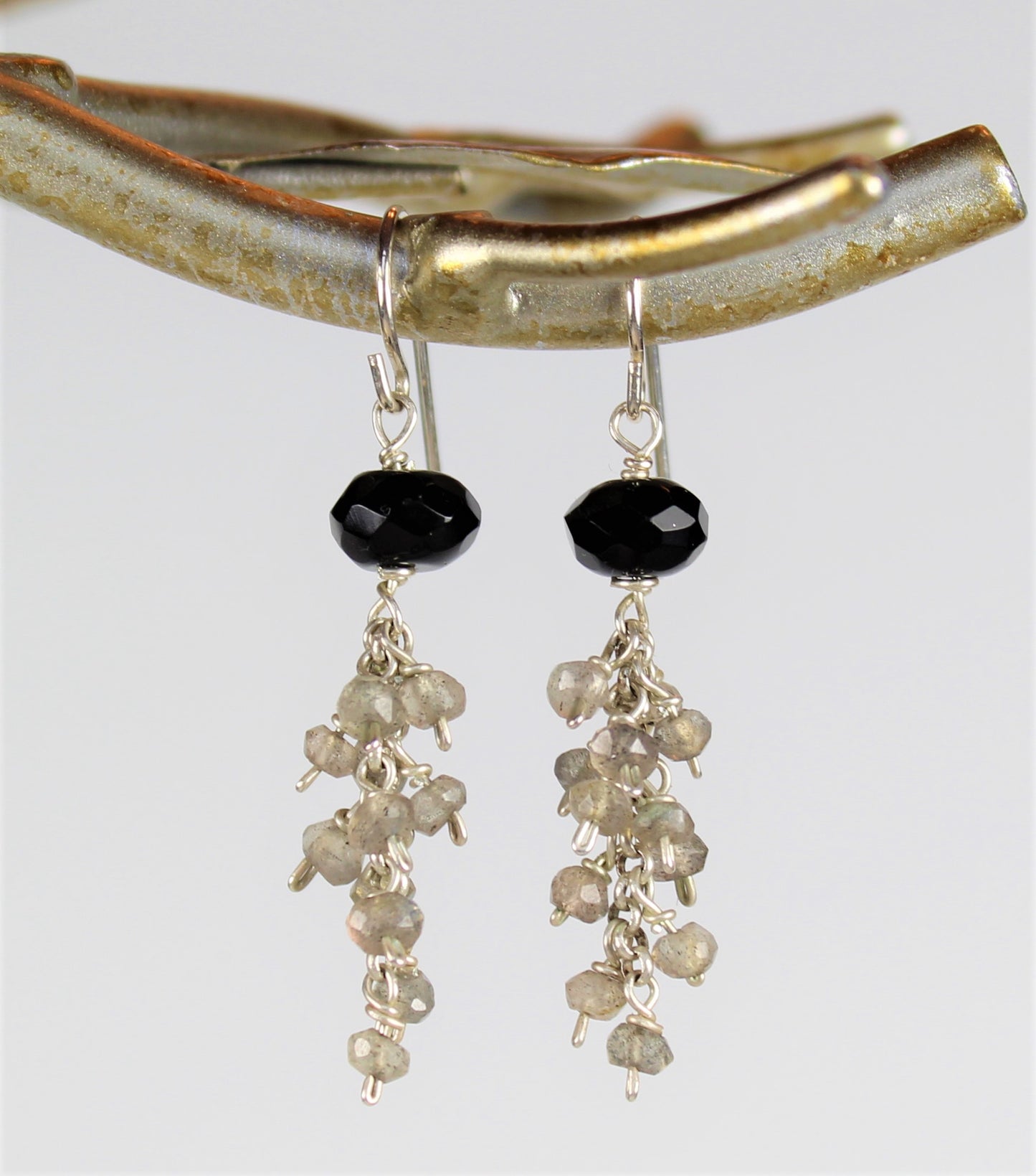 2 inch long sterling wire  earrings with larger black onyx and small faceted labradorite dangles