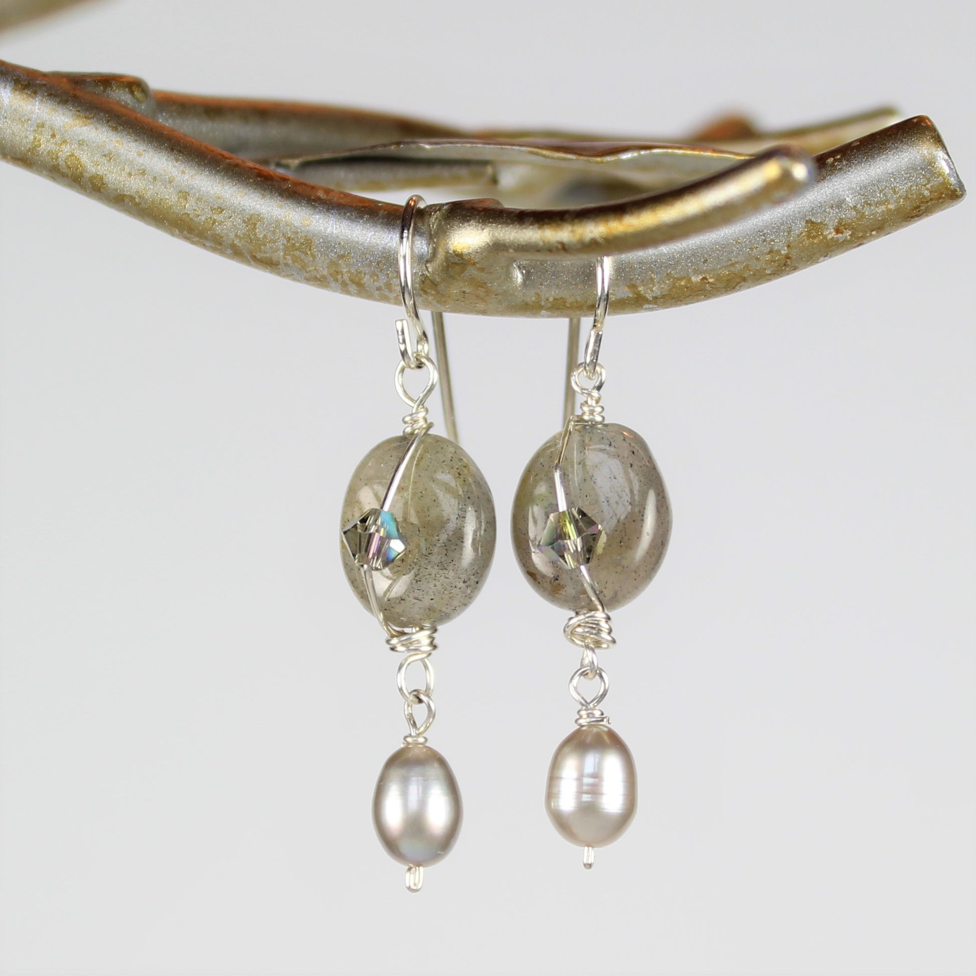 Sterling silver wire earrings feature smooth oval labradorite and pearl drops