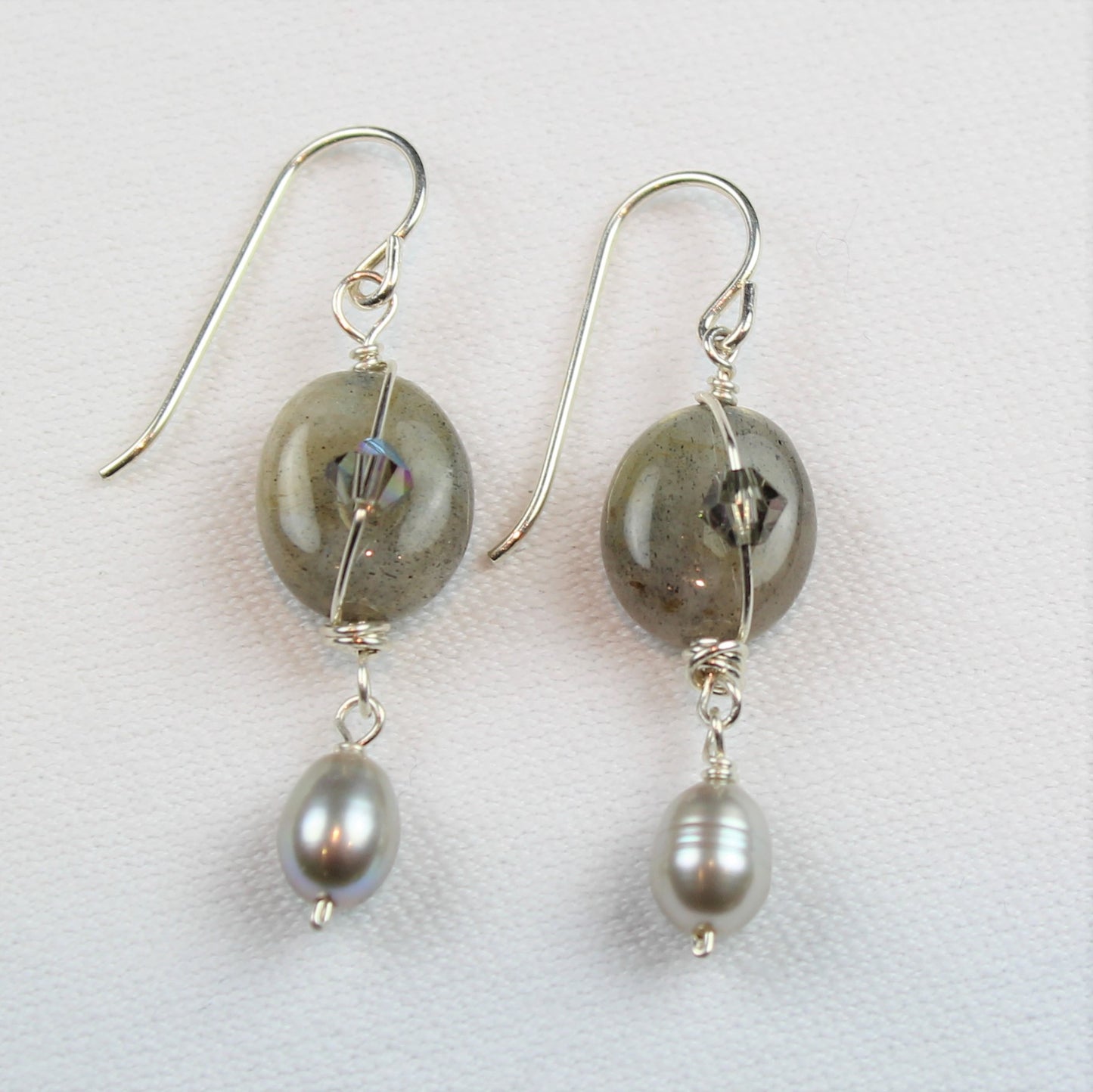 Oval smooth labradorite earrings with gray pearl dangles and wire detail with swarovski crystals